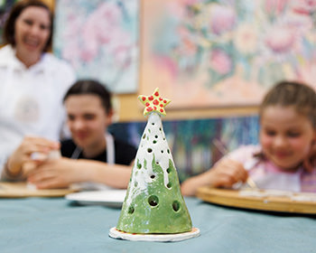ceramic-xmas-tree-people-in-background