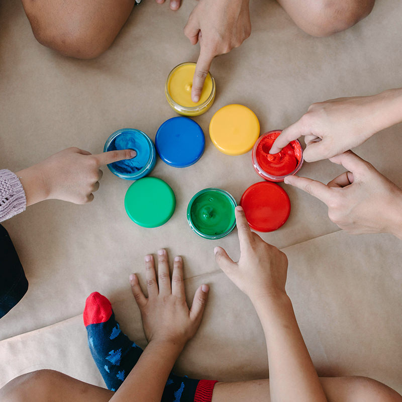 Fingers-in-paint-pots